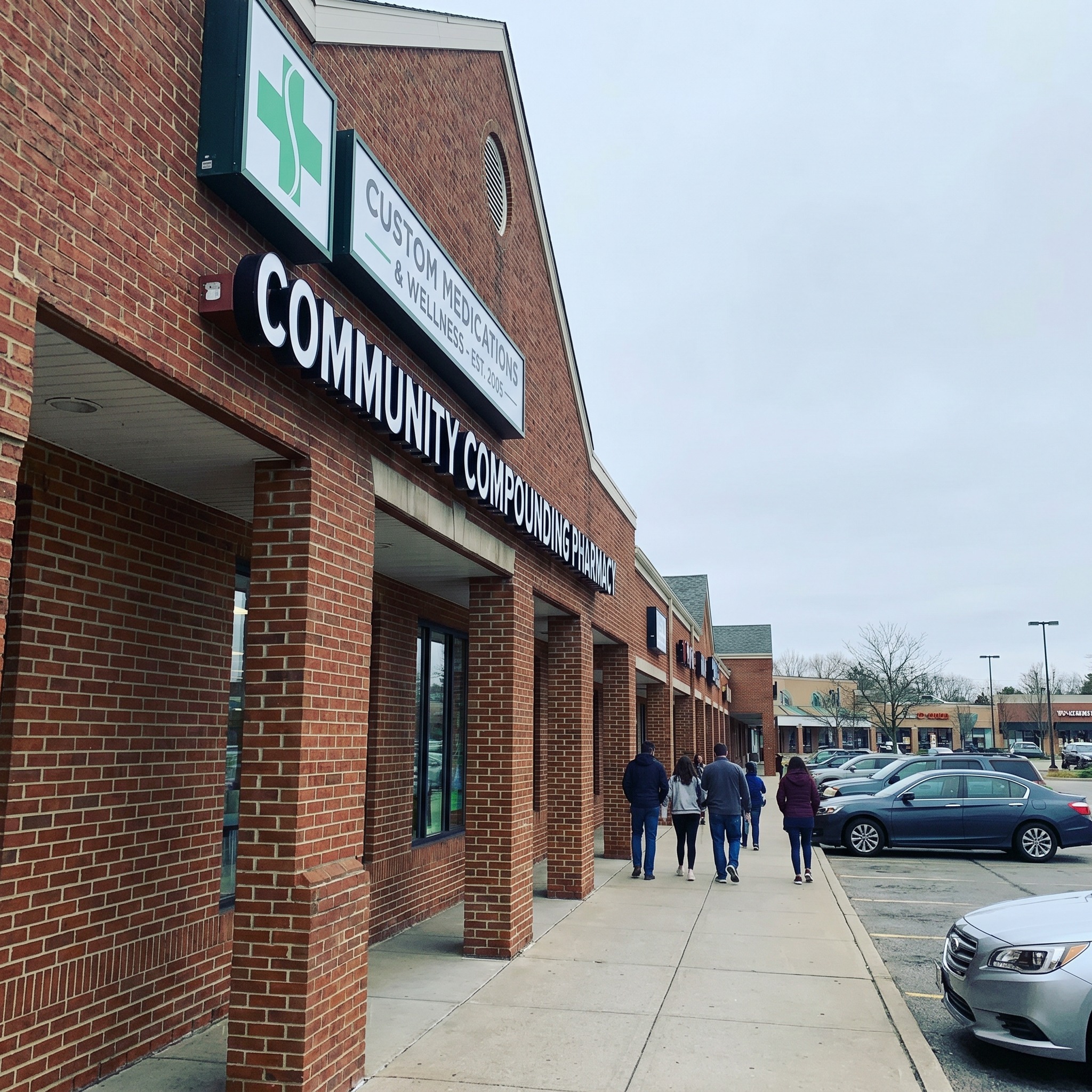 Exterior storefront of a licensed community compounding pharmacy